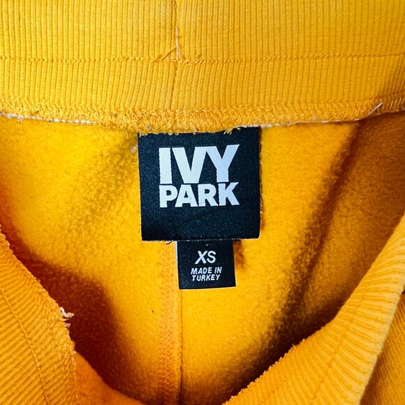 IVY PARK Logo Fleece Short Drawstring Waist Sporty Pockets Yellow - Picture 4 of 6